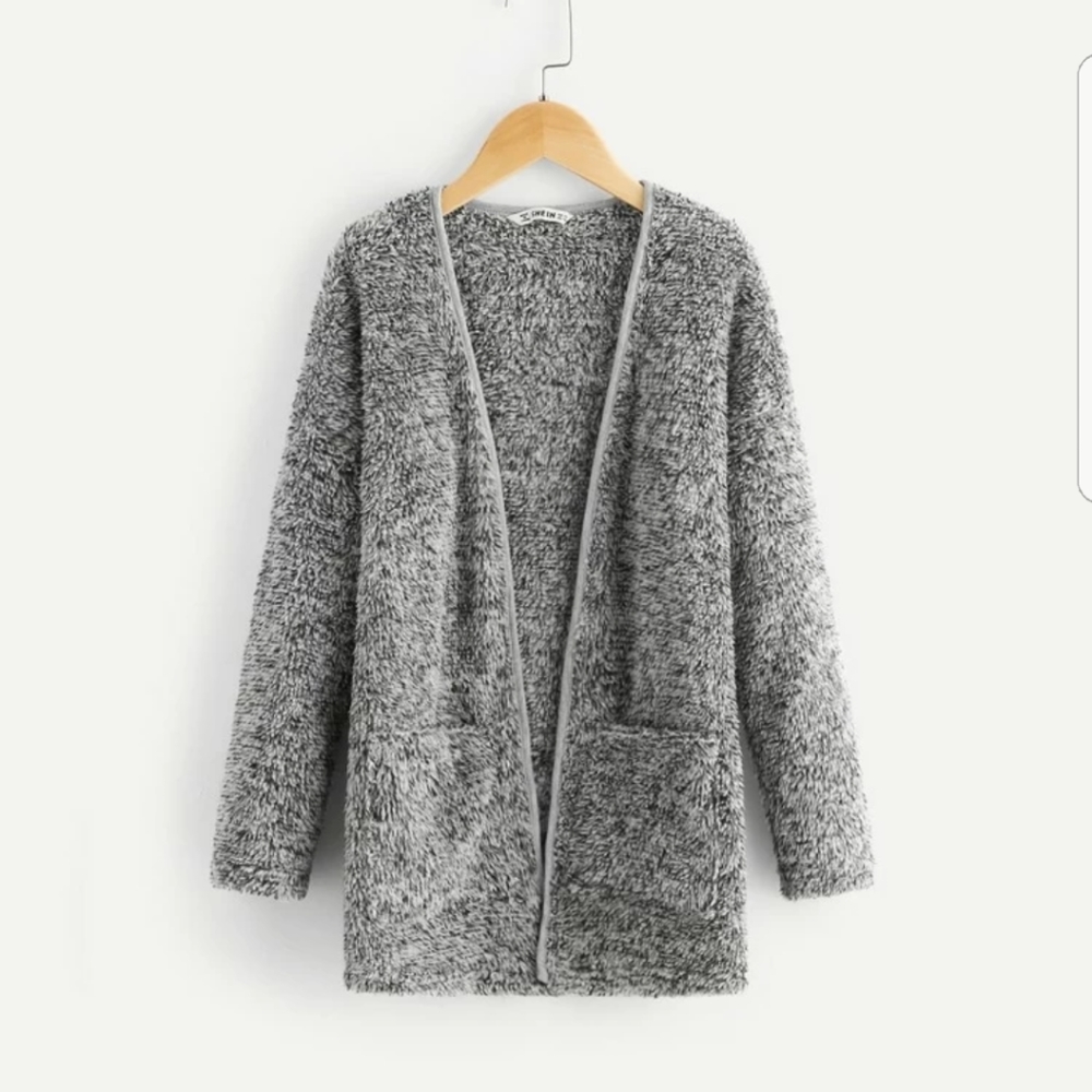 Girls.pocket front teddy coat size 130